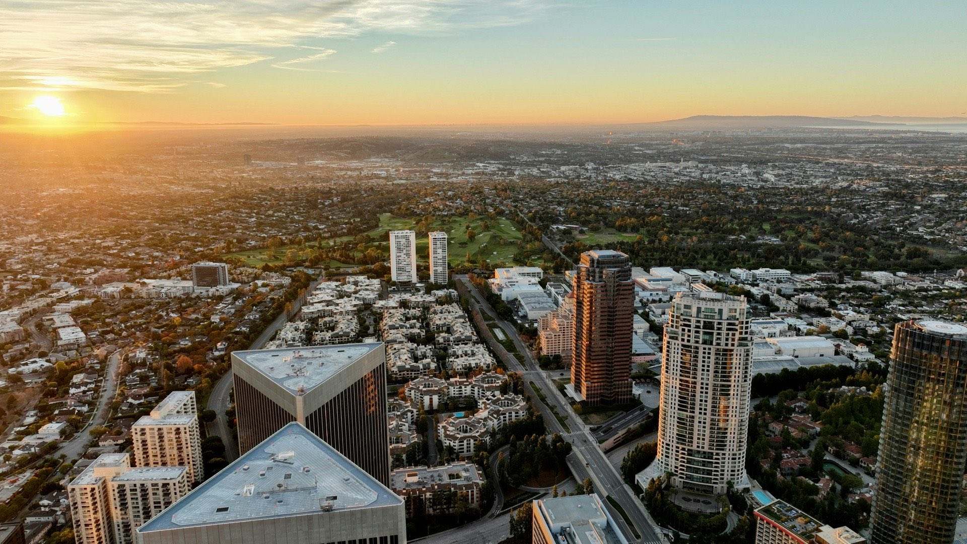 Aerial view of Century City towers at sunset